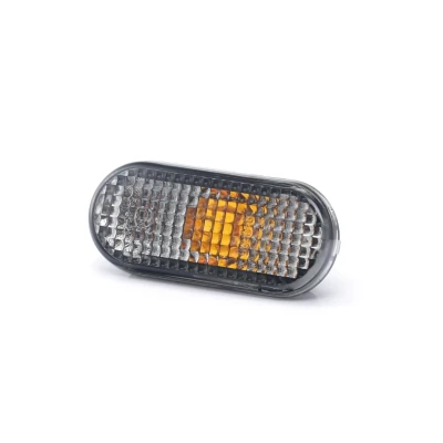 Imagem de TYC 18 3585 21 2 Intermitente cinzento fumo de ambos os lados, instalação lateral sem porta lâmpadas oval VOLKSWAGEN: GOLF 3, Polo III Hatchback